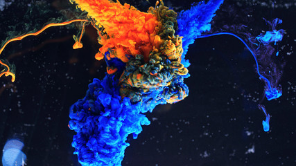 Macro photo shoot of colorful Ink in water. Power magic multi color Underwater Paint Drops...