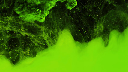 Macro photo shoot of colorful Ink in water. Power magic multi color Underwater Paint Drops...