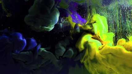 Macro photo shoot of colorful Ink in water. Power magic multi color Underwater Paint Drops...