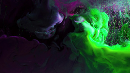 Macro photo shoot of colorful Ink in water. Power magic multi color Underwater Paint Drops...