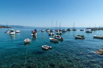 Obraz premium Boats on the water off the coast of Volosko, Croatia.
