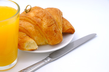 Breakfast served with croissants. Balanced diet.
