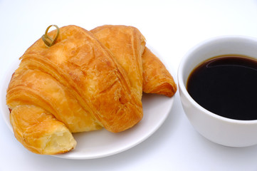 Breakfast served with croissants. Balanced diet.
