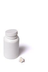 Container with capsules. White box and tabllets isolated on a white.