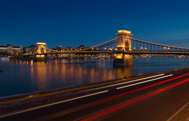 Fototapeta premium Széchenyi Chain Bridge, Budapest, Hungary. Long exposure photographs at night from the Pest side.