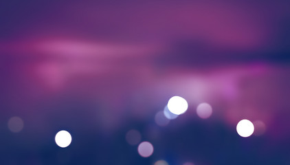blurred purple abstract background with bokeh lights