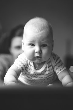 Close-up Portrait Of Baby Dripping Saliva