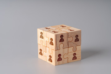 Obraz premium Business & HR icon on wood jigsaw puzzle cube