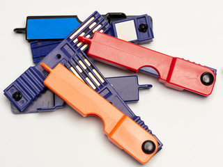 Pile of prepayment electricity meter keys.