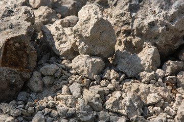 Background pile of stones on sunny weather