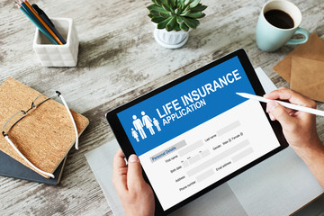 Life insurance online application form on device screen.