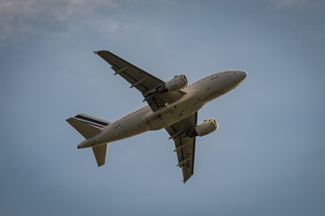 Fototapeta na wymiar Plane taking off in El Prat Barcelona airport, Catalonia, Spain