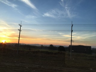 power lines at sunrise