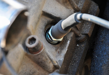 spark plug in the engine. blurring