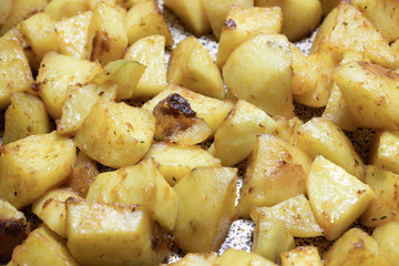 baked potatoes on a baking sheet