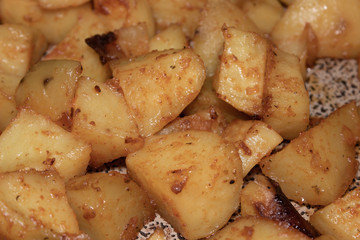baked potatoes on a baking sheet