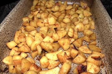 baked potatoes on a baking sheet
