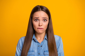 Portrait of beautiful frustrated girl listen news about her work mistake feel fear bite nails wear...