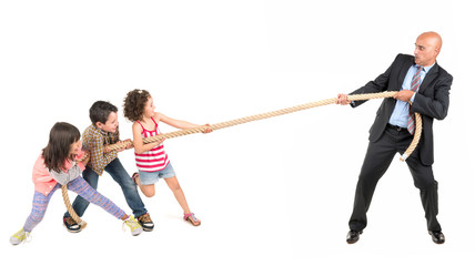 Man against kids rope pulling
