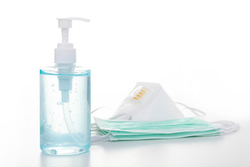 Medical surgical mask with alcohol sanitizer gel hand wash for covid-19 Coronavirus prevention concept..