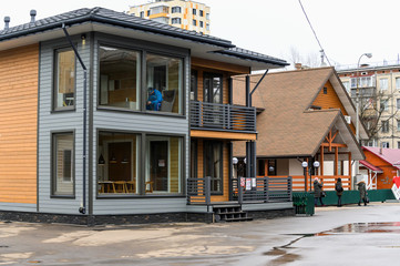 Moscow, Russia, February 2020. Exhibition sale of modern wooden houses.