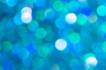 Abstract bright blue bokeh background