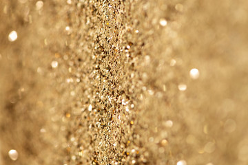 Sparkly gold glitter background texture