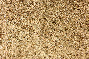 Sparkly gold glitter background texture