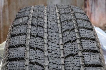 Large, car tire tread. Winter tires. Car wheel detail