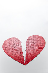Heart jigsaw puzzle on white background 