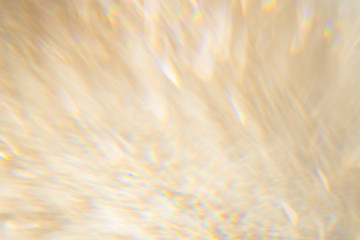 Blurry golden glitter background texture