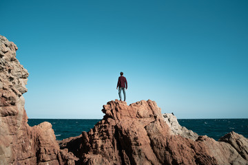 man on rocks  beach