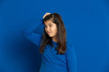 Preteen girl with blue jersey