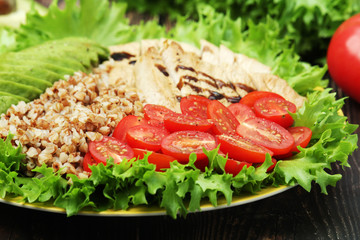 Turkey breast, avocado, salad and buckwheat as healthy lunch