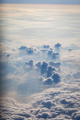 Sky and clouds from above the ground viewed from an airplane