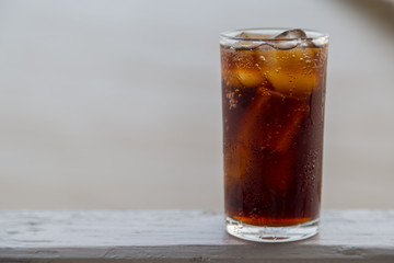 Cola with ice in the glass ready to drink for refresh