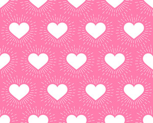 Seamless pattern. White Heart with rays on pink background. Vector illustration. The idea for holiday designs, greeting cards, holiday prints, designer packaging, stylish textile, etc.