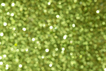 Shiny green glitter textured background