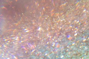 Fototapeta na wymiar Brownish hologram glittery background