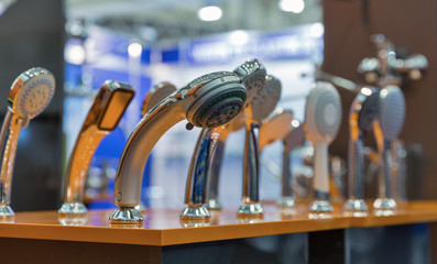 Shower heads on the stand in a hardware store