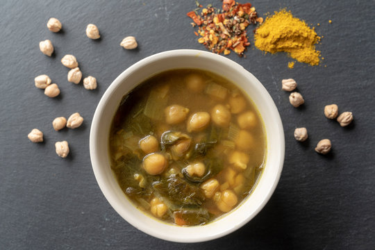 Chickpeas with spinach, curry and arrabiata - stock photography