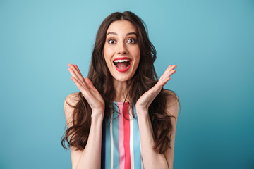 Photo of excited nice woman expressing surprise at camera