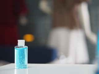 Hand Sanitizer, gel alcoholic mixture with gelatin in clear Plastic bottle with pump pushing wash clean dirty to prevent germs protect Contagious disease corona virus, covid-19