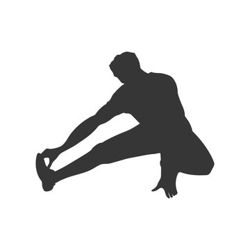 Black silhouette of stretching man. Gymnastic exercise. Outdoor fitness. Young active boy. Isolated workout image
