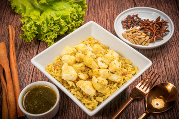 Yellow curried rice with crab, Thai yellow rice crab biryani with green coriander sauce
