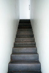 Fototapeta na wymiar Interior architecture and design of white wall room decorated with metal and iron staircase