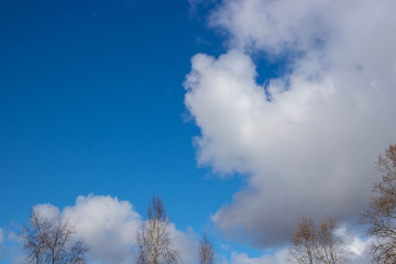 Obraz na płótnie Canvas Beautiful blue sky with white clouds. Spring weather