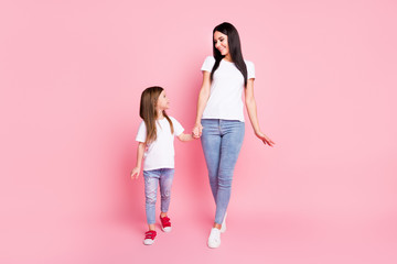 Full length body size view of two nice attractive lovely pretty cheerful cheery careful friendly...