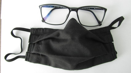 a black anty covid mask and glasses 2 - obrazy, fototapety, plakaty