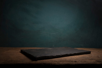 Empty top of natural stone shelves and stone wall background. For product display